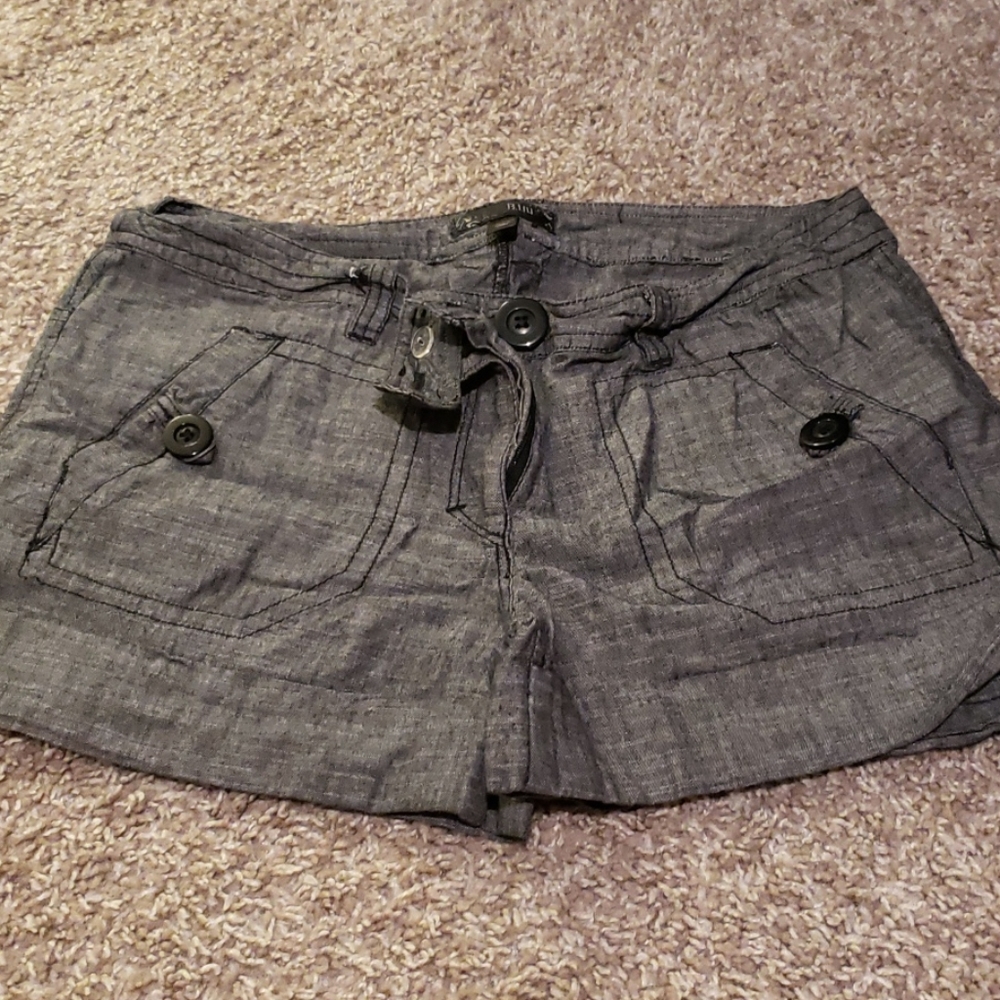 Dark gray linen shorts.